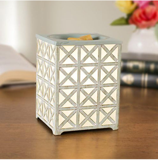 "Mini Melts: Compact Wax Warmer for Scented Delights"